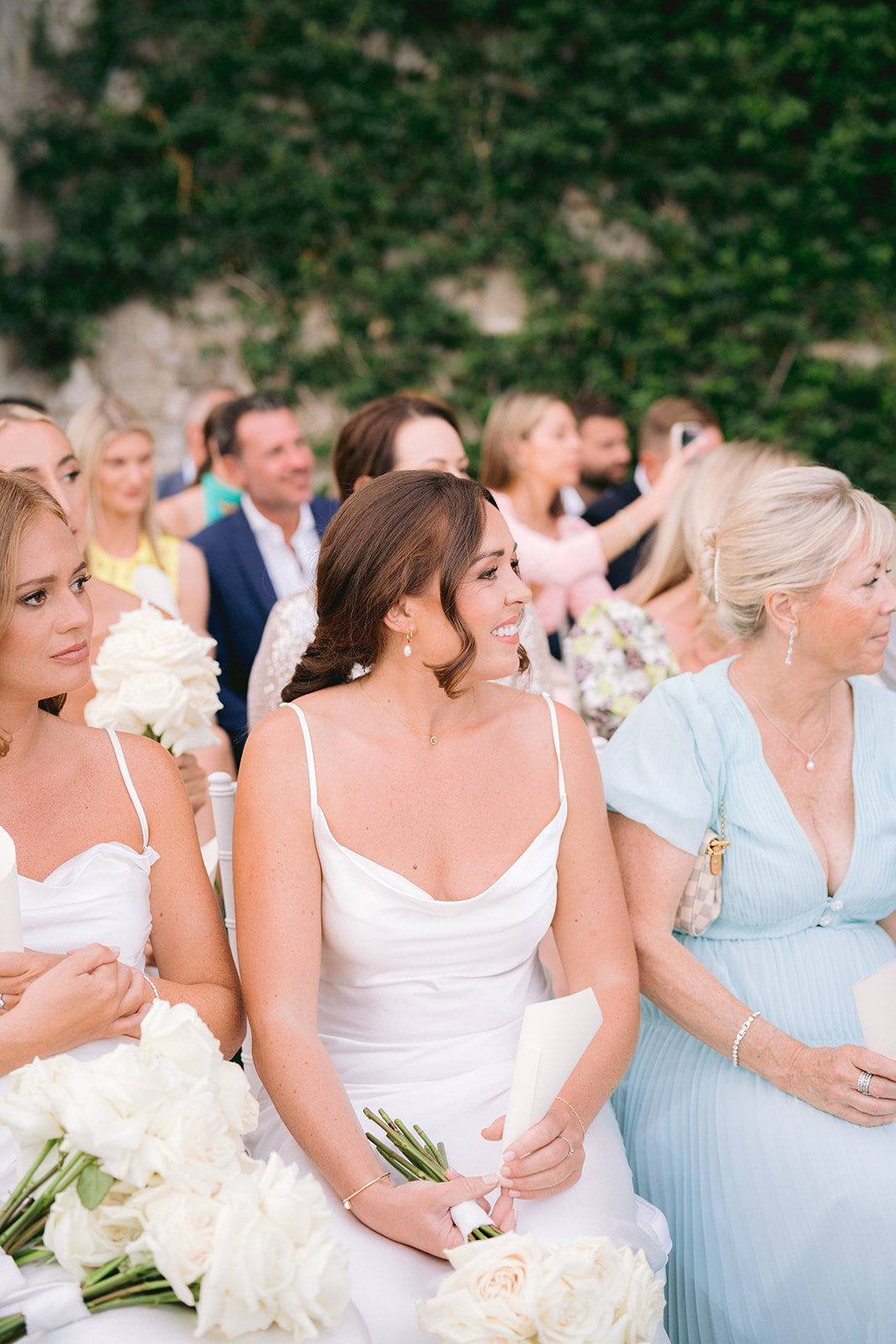 Andrea Gallucci - Destination Wedding Photographer- Amalfi Coast Positano Santorini Barcellona Rome Ravello Paris New York happy bridesmaid during garden wedding ceremony