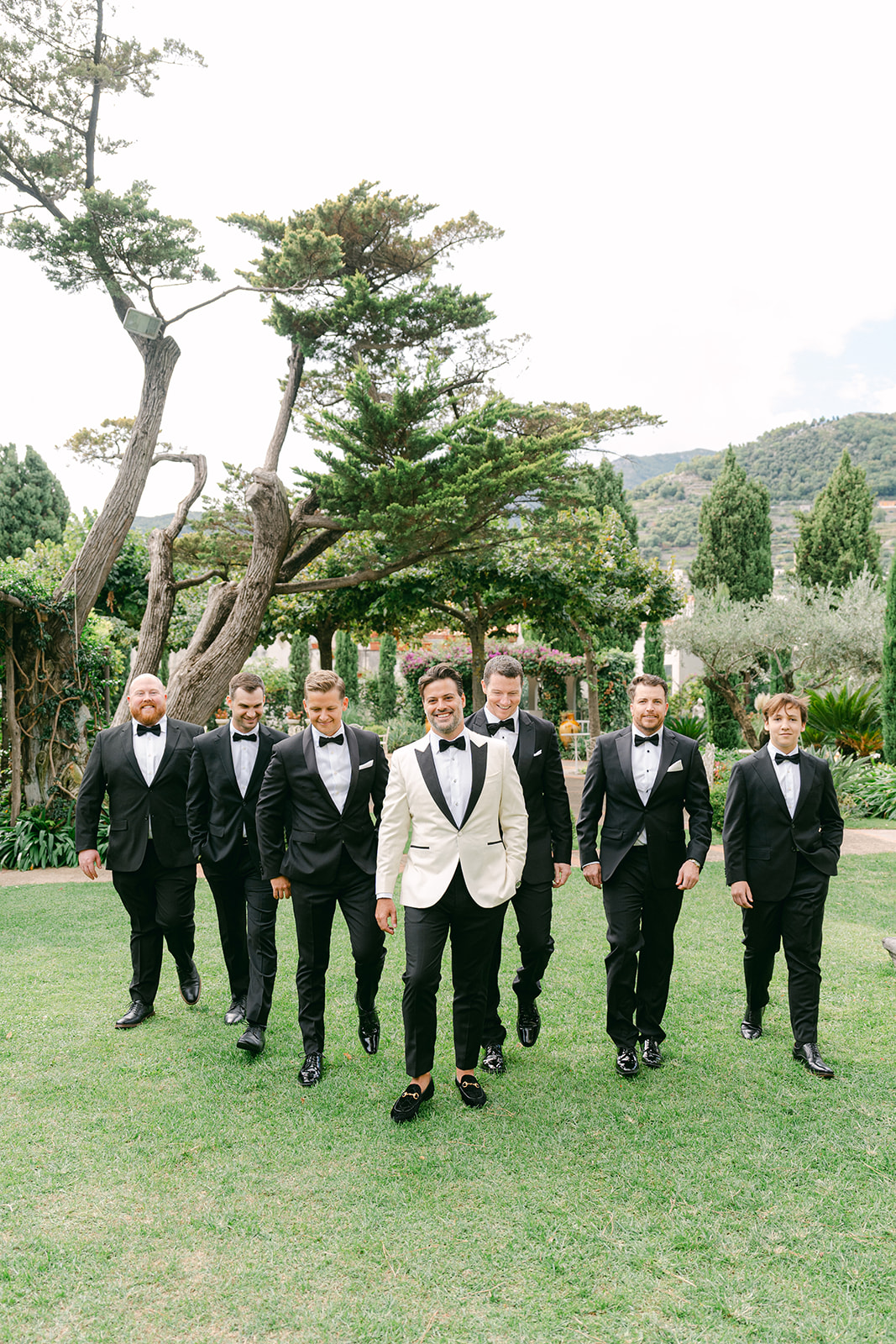 Andrea Gallucci - Destination Wedding Photographer- Amalfi Coast Positano Santorini Barcellona Rome Ravello Paris New York candid wedding photo of the groom and gromsmen