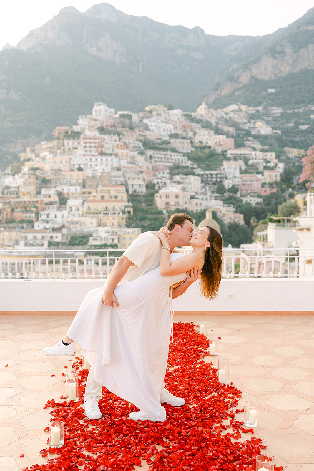 Andrea Gallucci - Destination Wedding Photographer- Amalfi Coast Positano Santorini Barcellona Rome Ravello Paris New York romantic rose petals setup for surprise proposal