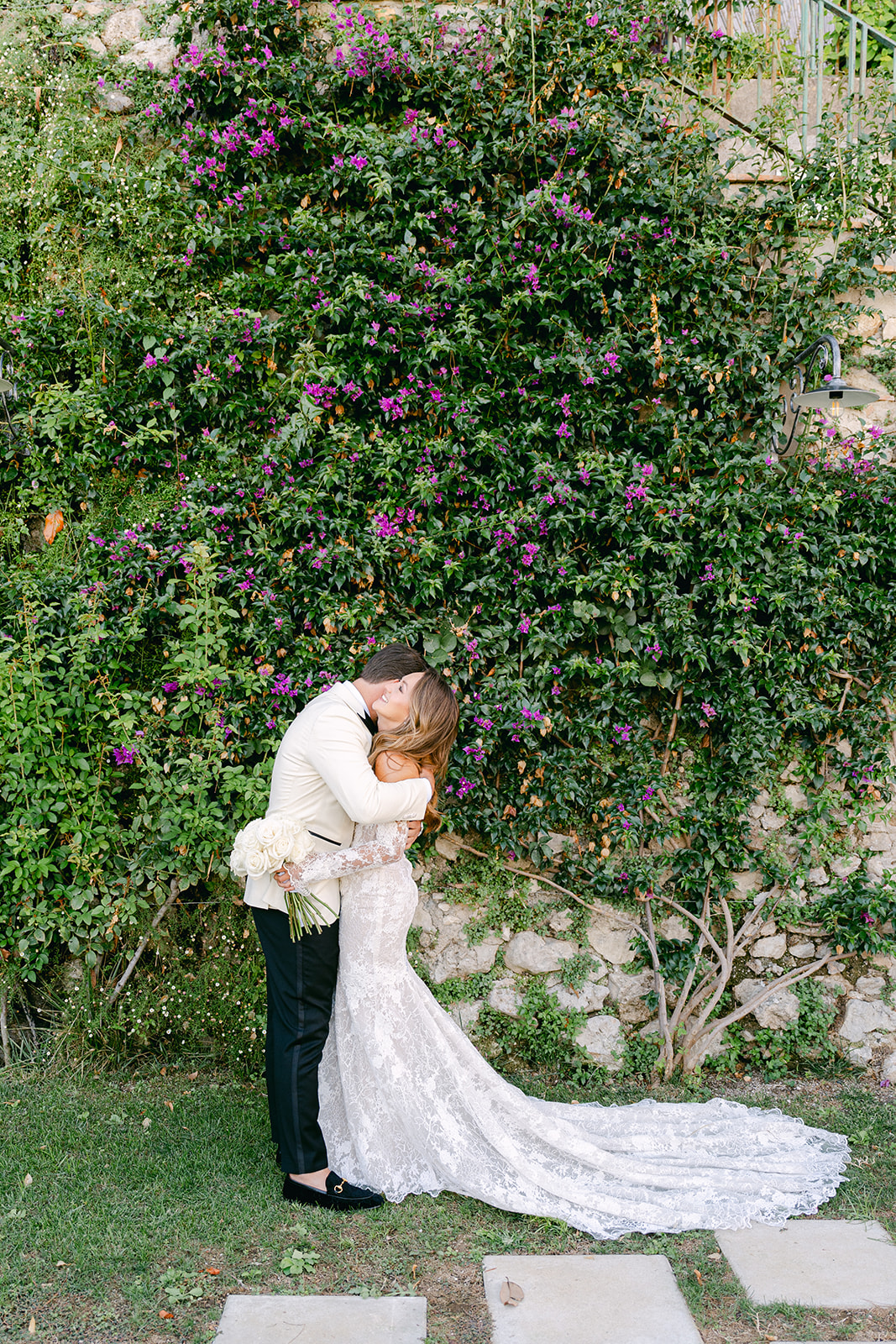 Andrea Gallucci - Destination Wedding Photographer- Amalfi Coast Positano Santorini Barcellona Rome Ravello Paris New York groom hugging bride for first look