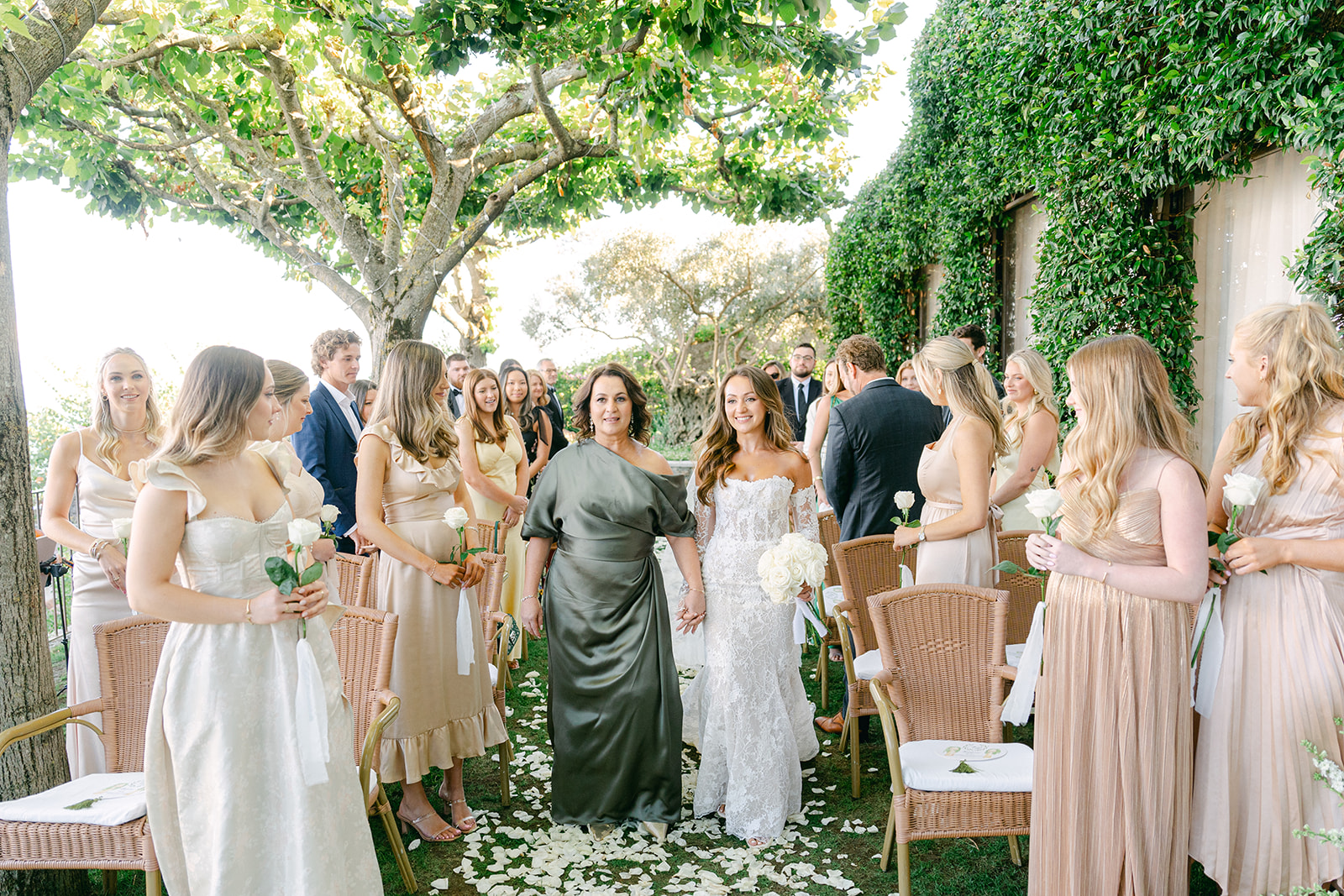 Andrea Gallucci - Destination Wedding Photographer- Amalfi Coast Positano Santorini Barcellona Rome Ravello Paris New York bride and mother of the bride walking in the wedding ceremony aisle
