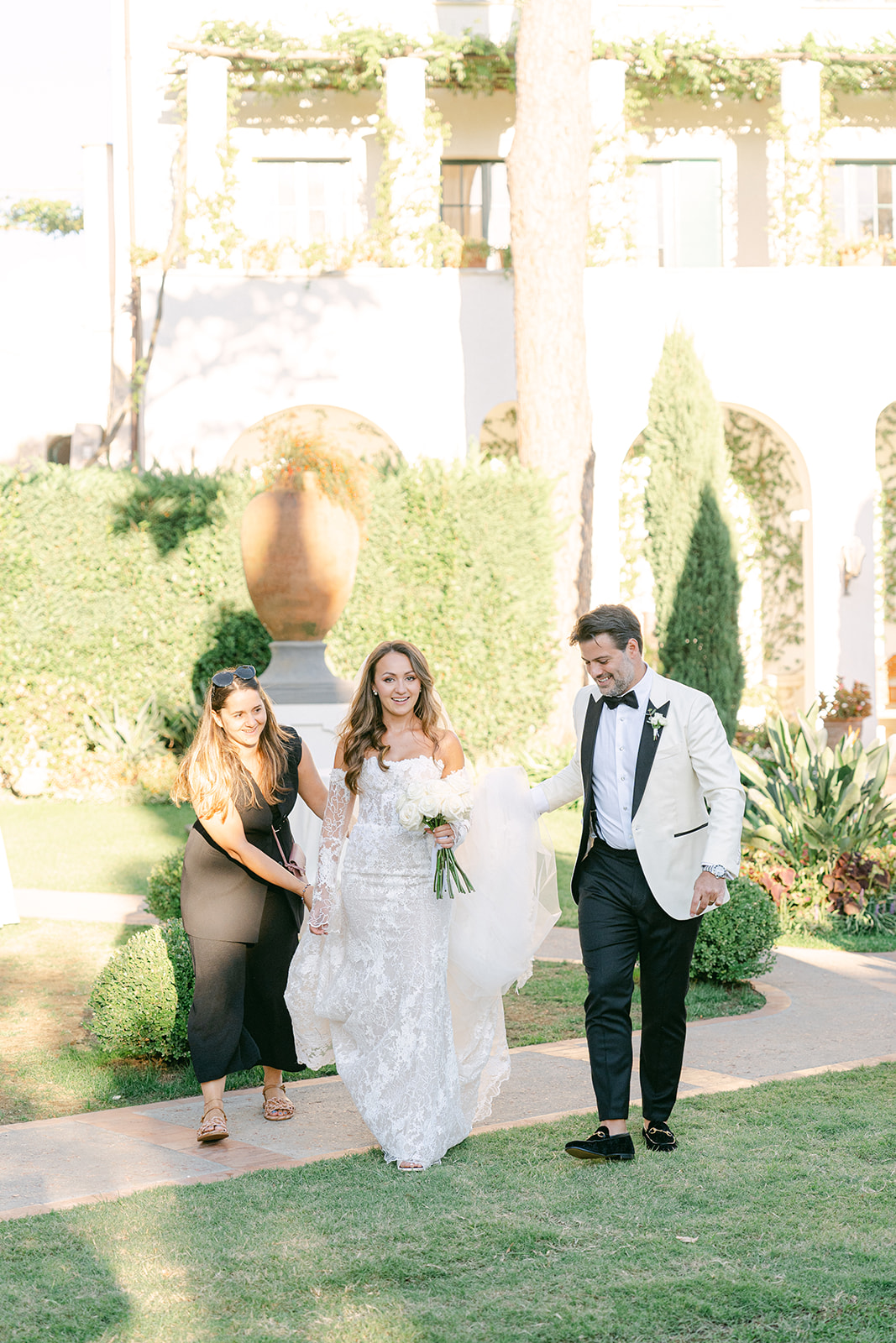 Andrea Gallucci - Destination Wedding Photographer- Amalfi Coast Positano Santorini Barcellona Rome Ravello Paris New York wedding planner helping the bride