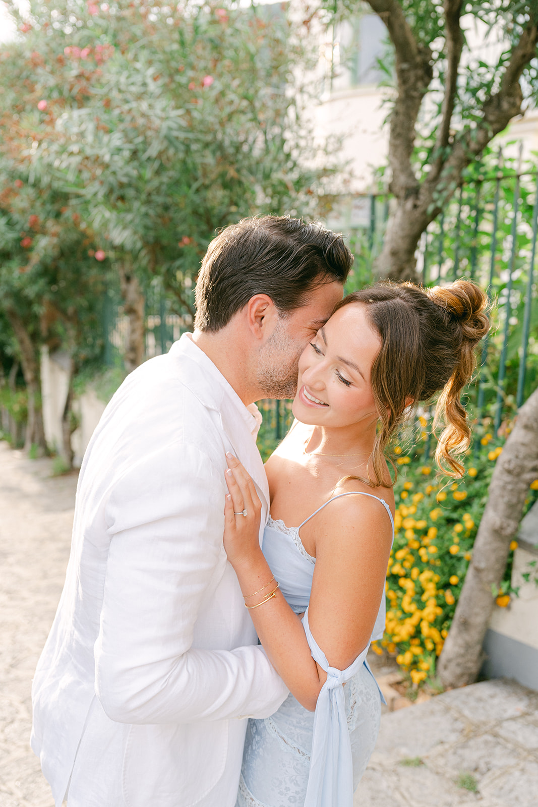 Andrea Gallucci - Destination Wedding Photographer- Amalfi Coast Positano Santorini Barcellona Rome Ravello Paris New York romantic portrait of bride and groom hugging