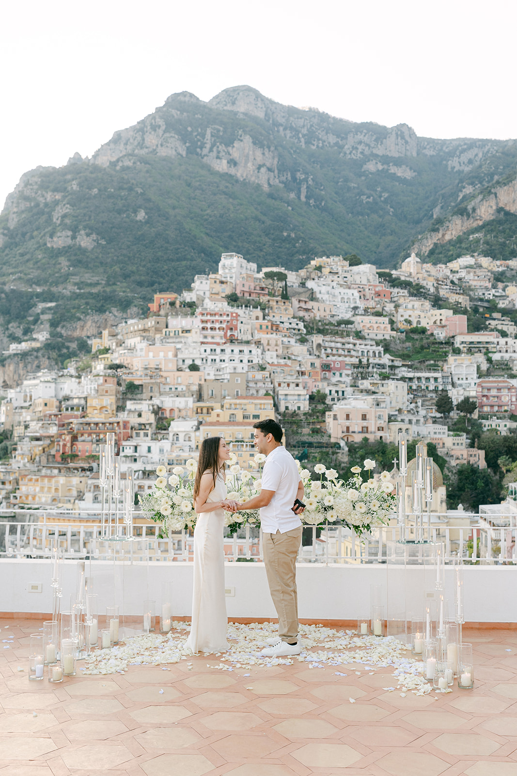 Andrea Gallucci - Destination Wedding Photographer- Amalfi Coast Positano Santorini Barcellona Rome Ravello Paris New York quiet luxury wedding proposal setup with white flowers in Amalfi Coast