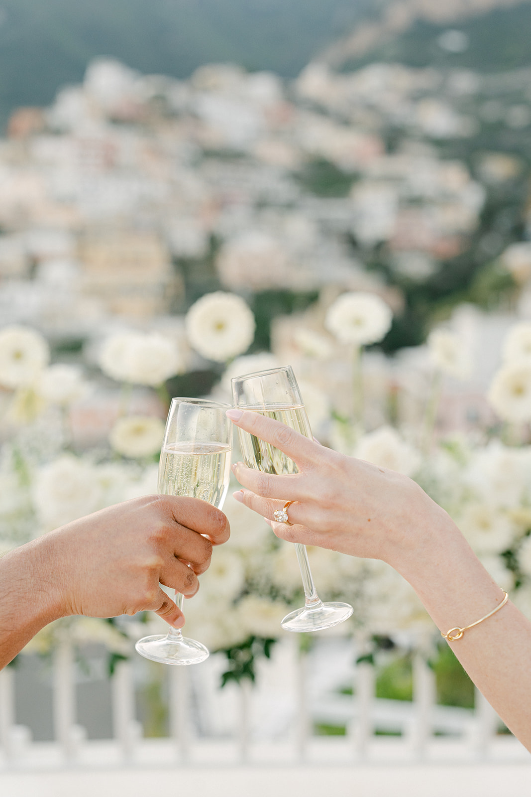 Andrea Gallucci - Destination Wedding Photographer- Amalfi Coast Positano Santorini Barcellona Rome Ravello Paris New York romantic surprise engagement photo of couple toasting