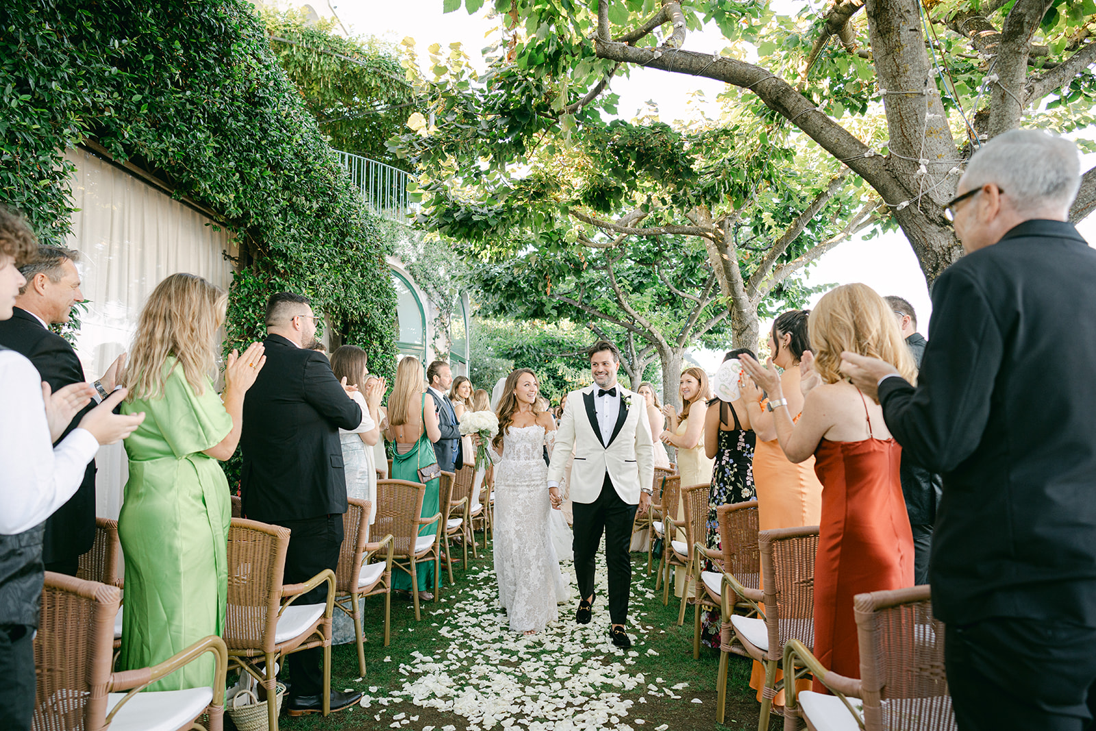 Andrea Gallucci - Destination Wedding Photographer- Amalfi Coast Positano Santorini Barcellona Rome Ravello Paris New York bride and groom walking off the wedding ceremony aisle