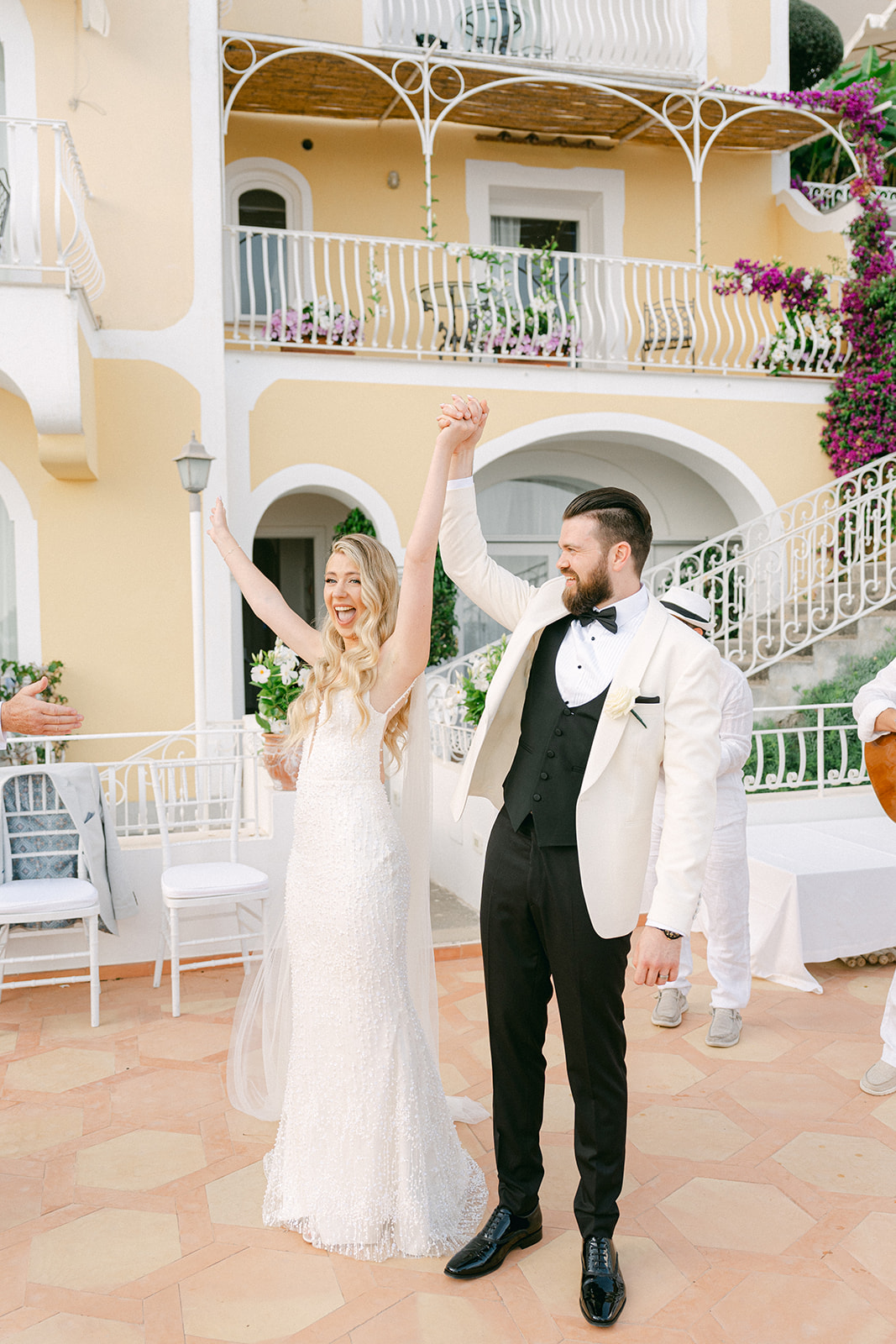 Andrea Gallucci - Destination Wedding Photographer- Amalfi Coast Positano Santorini Barcellona Rome Ravello Paris New York Just married couple walking through Hotel Marincanto garden