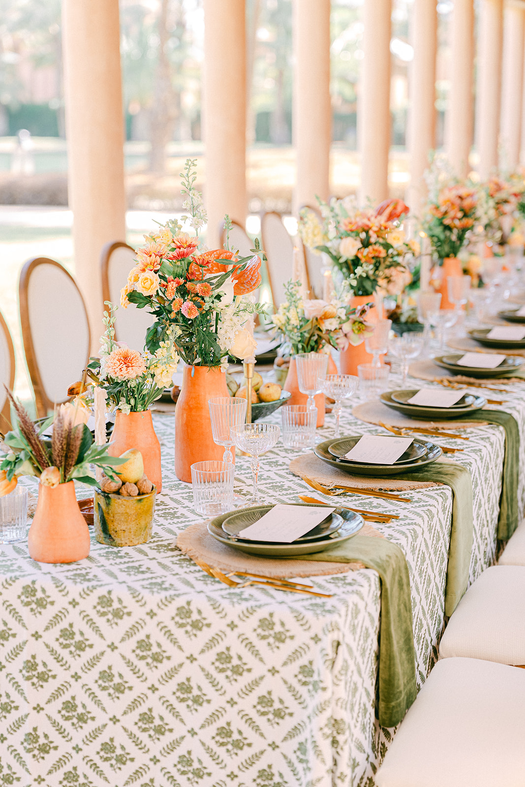 Morocco wedding table details with natural tones and a romantic courtyard backdrop