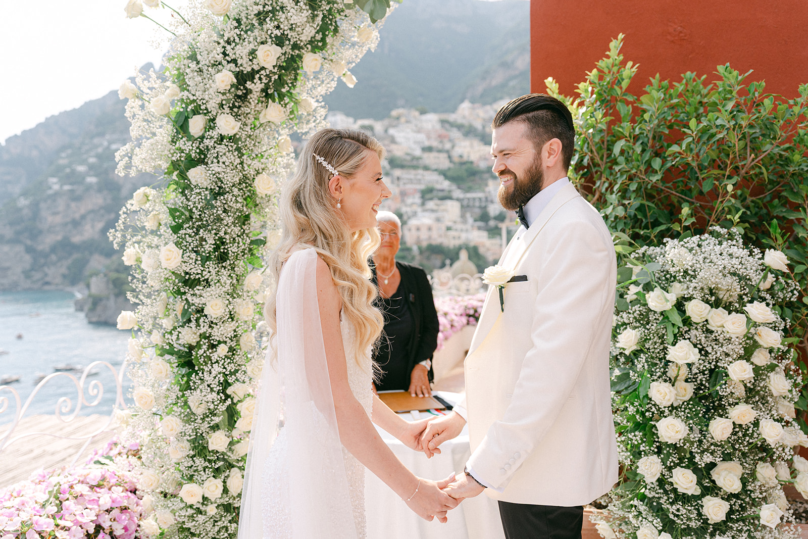 Andrea Gallucci - Destination Wedding Photographer- Amalfi Coast Positano Santorini Barcellona Rome Ravello Paris New York candid wedding photo of bride and groom during ceremony in Positano