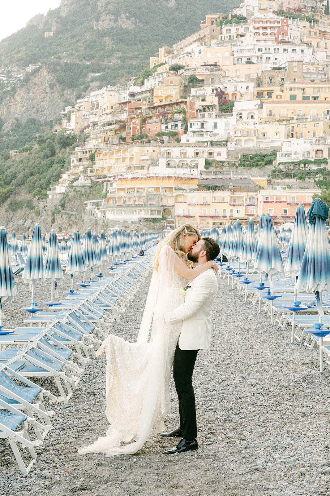 Andrea Gallucci - Destination Wedding Photographer- Amalfi Coast Positano Santorini Barcellona Rome Ravello Paris New York romantic wedding portrait at the Positano beach