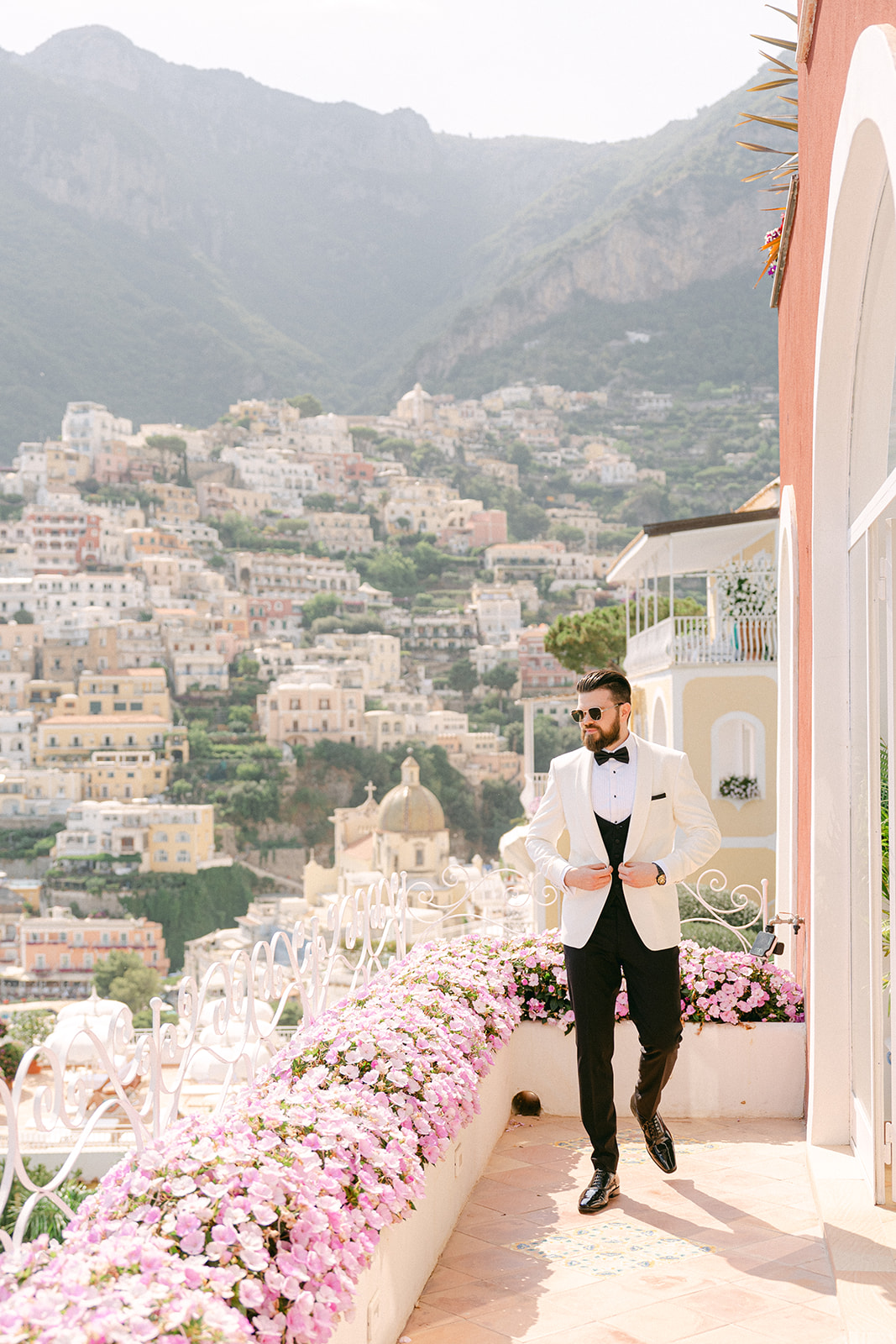 Andrea Gallucci - Destination Wedding Photographer- Amalfi Coast Positano Santorini Barcellona Rome Ravello Paris New York Groom adjusting jacket before intimate Amalfi Coast wedding