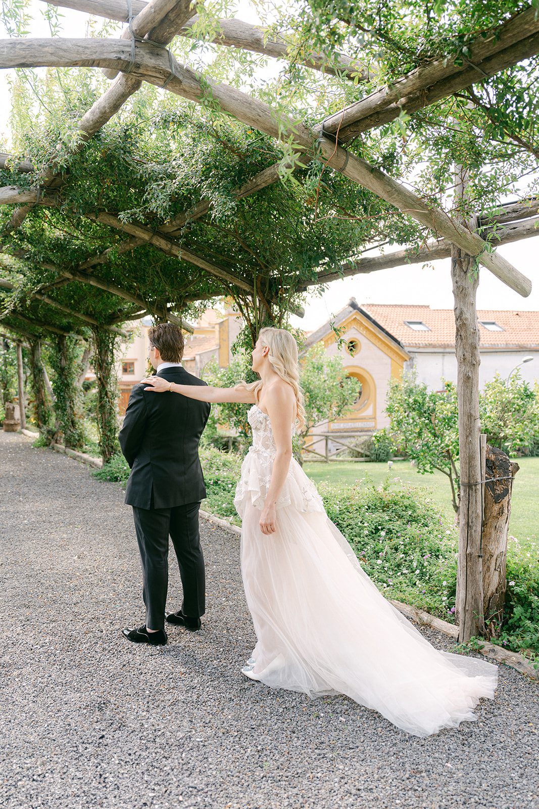 Stylish Italian wedding photography capturing the first look at Italian villa