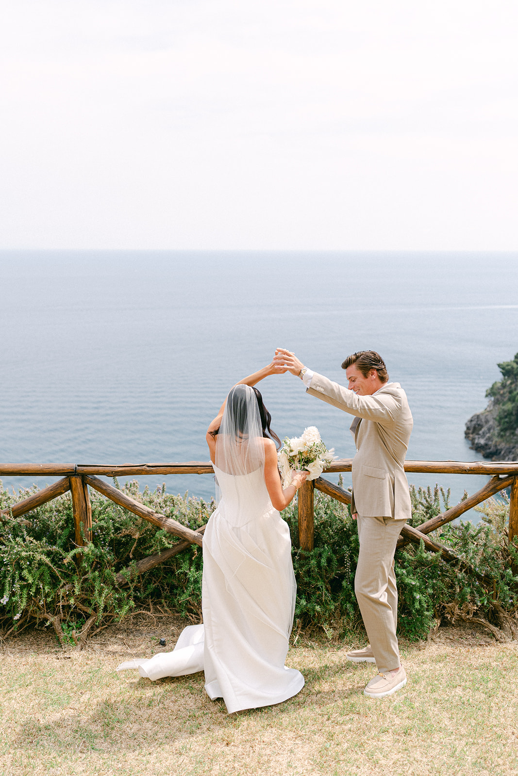 groom twirling the bride during their Amalfi Coast first look