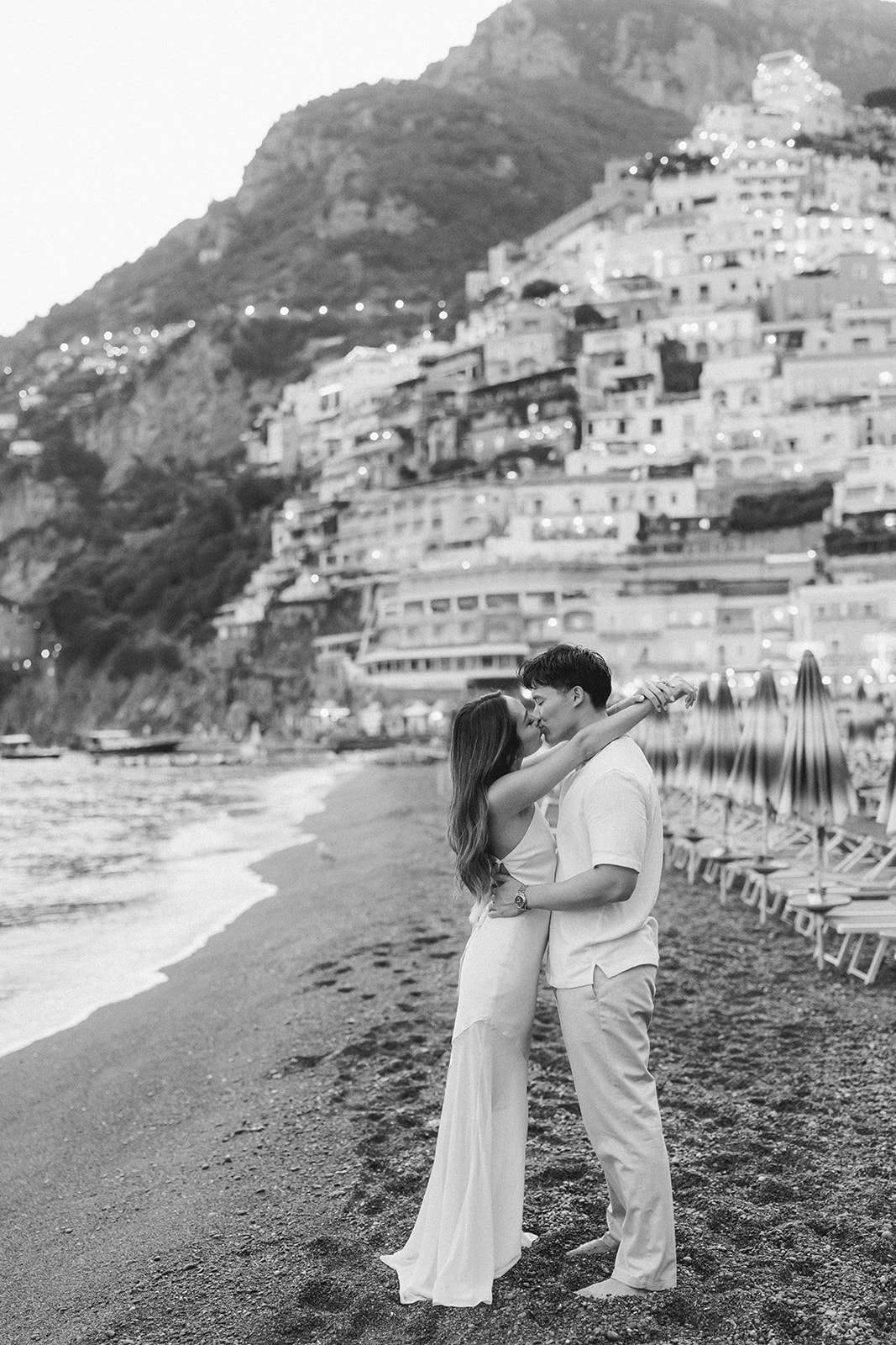 Sunset outdoor engagement photos in Italy with romantic Positano backdrop