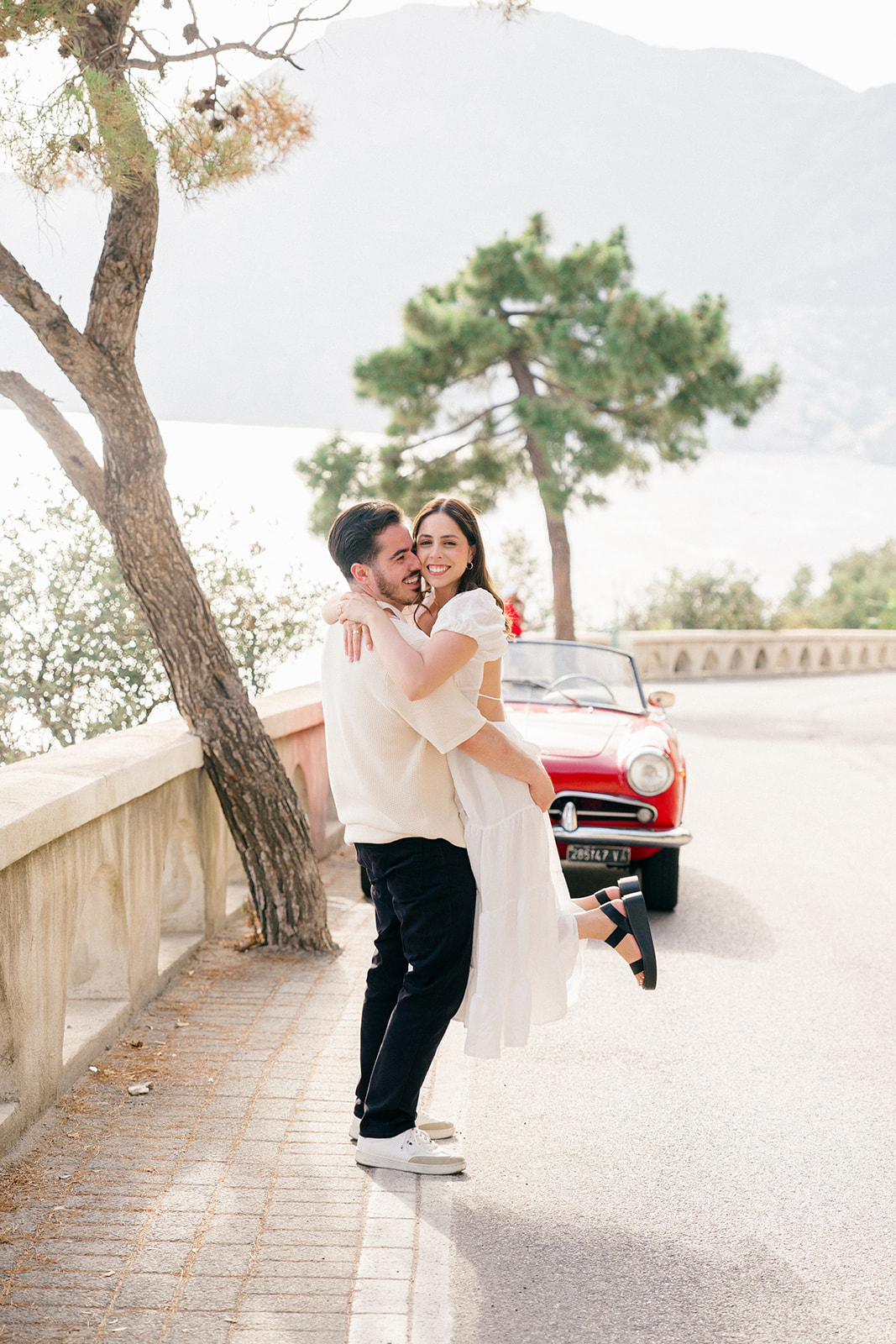 Candid portrait with rental car during Amalfi Coast engagement photography