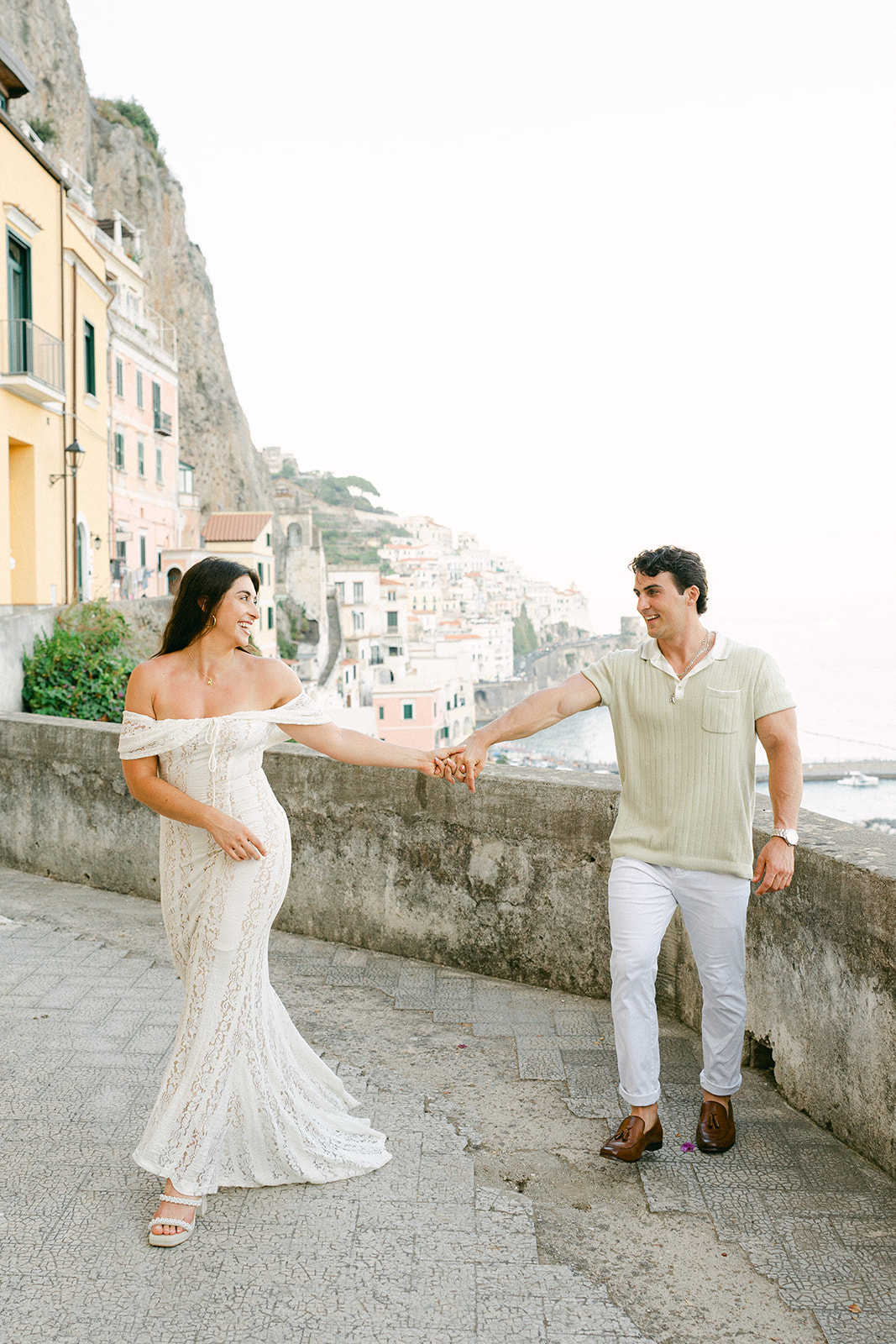 Bride-to-be wearing comfortable shoes for Amalfi Coast outdoor engagement photos