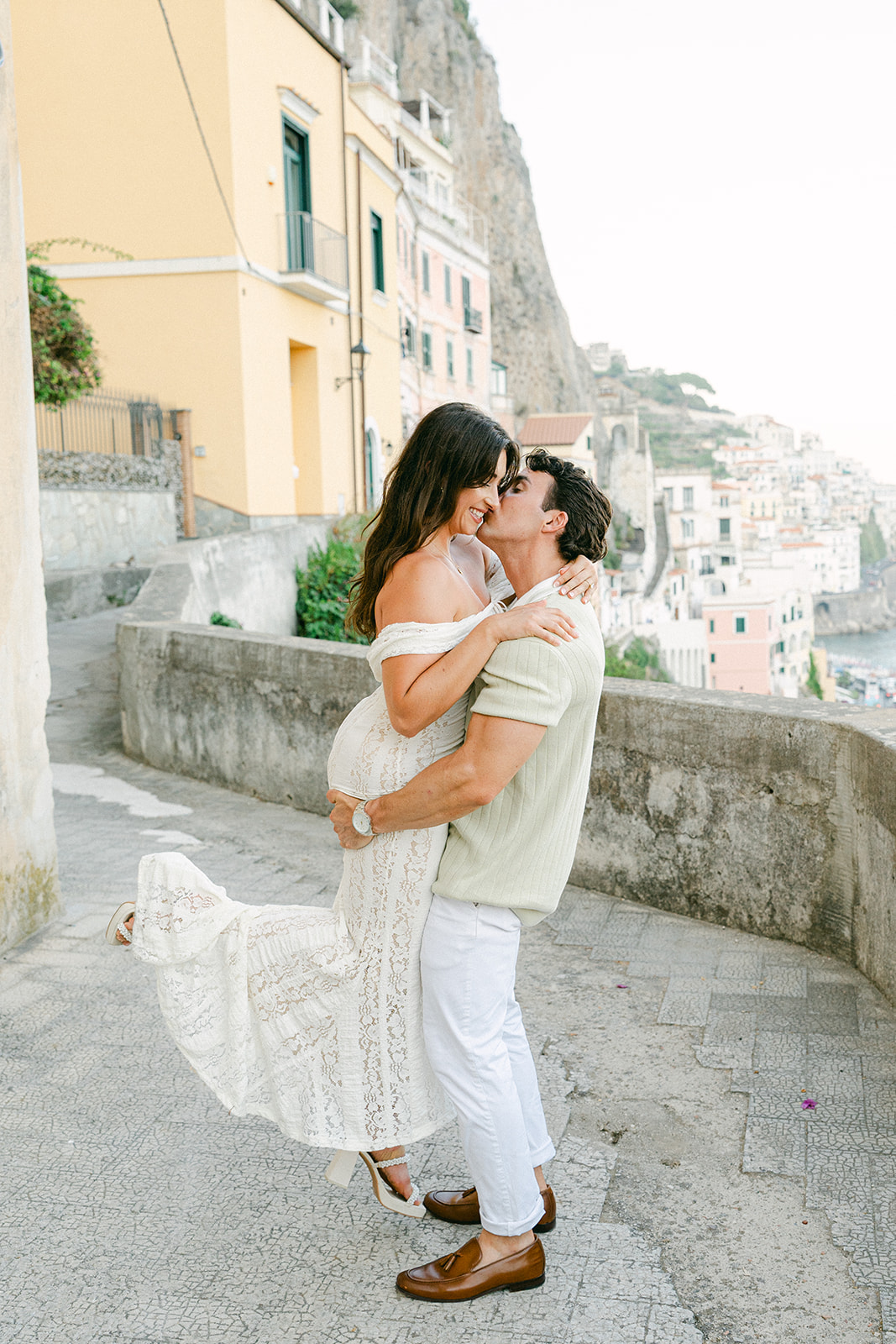 Couple enjoying a kiss during Italy engagement photos on Amalfi Coast