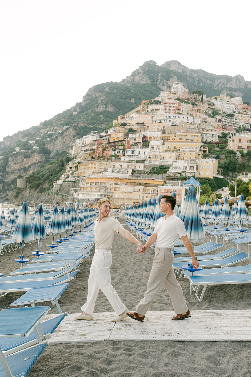 Outdoor engagement photo poses with cobblestone Amalfi streets