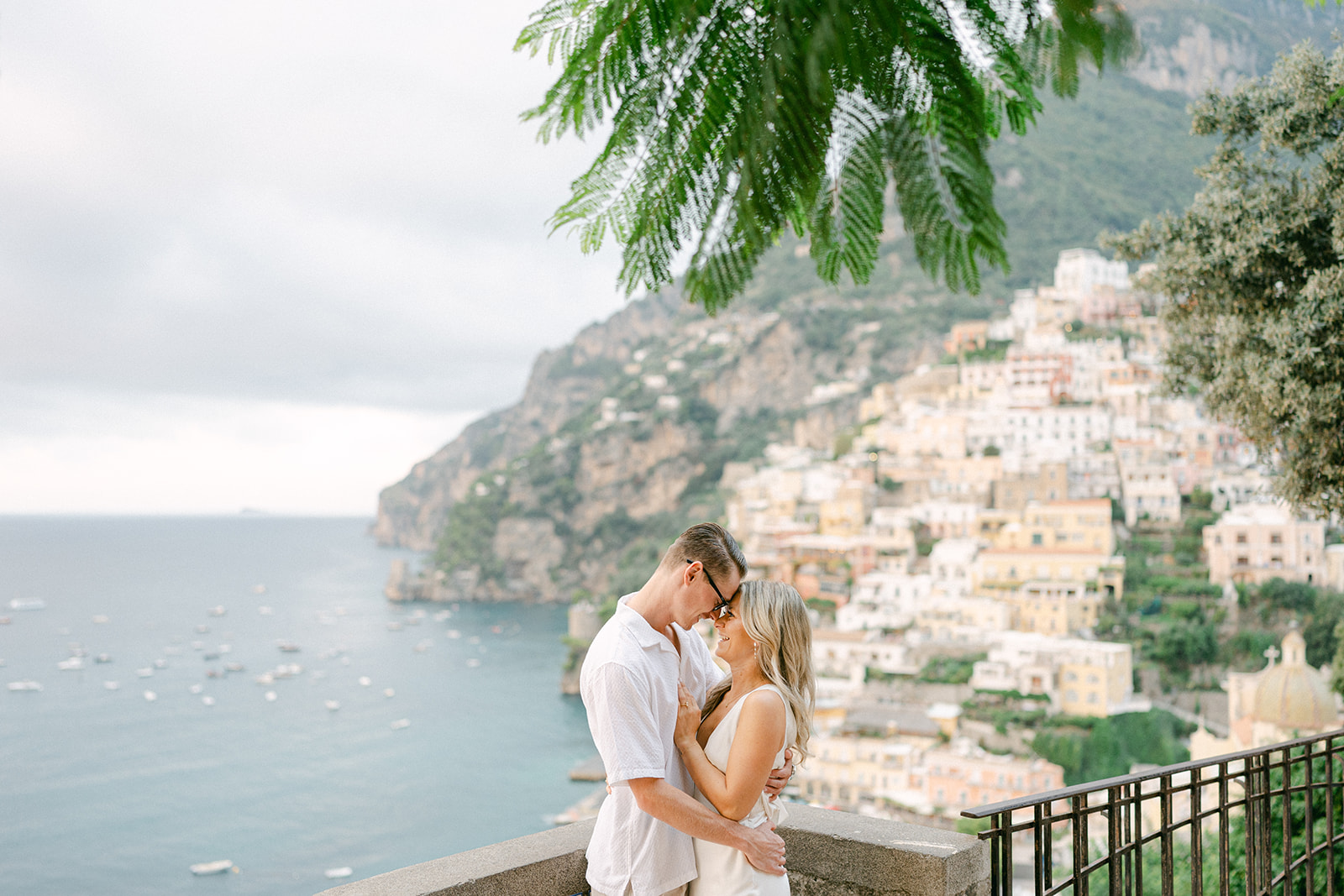 Couple during their engagement photoshoot in Positano, Italy overlooking the Amalfi Coast