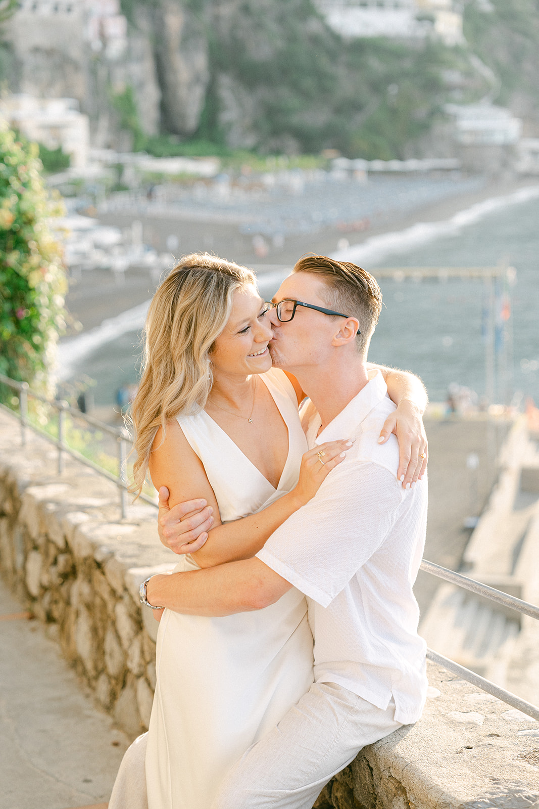 Romantic engagement session on the cliffs of Positano with sea views
