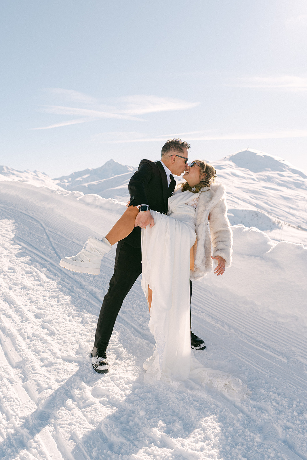 Couple portraits at a snowy Dolomites wedding