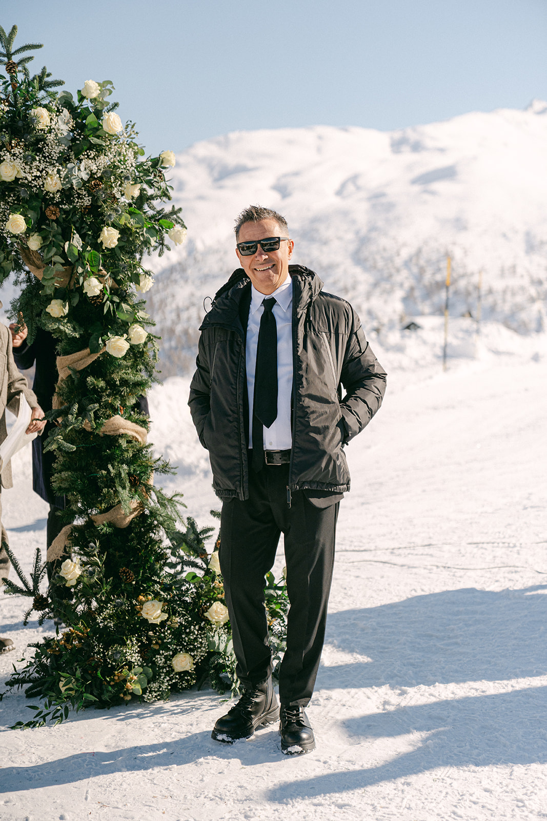 Groom portraits during a winter wedding in the Dolomites, Italy