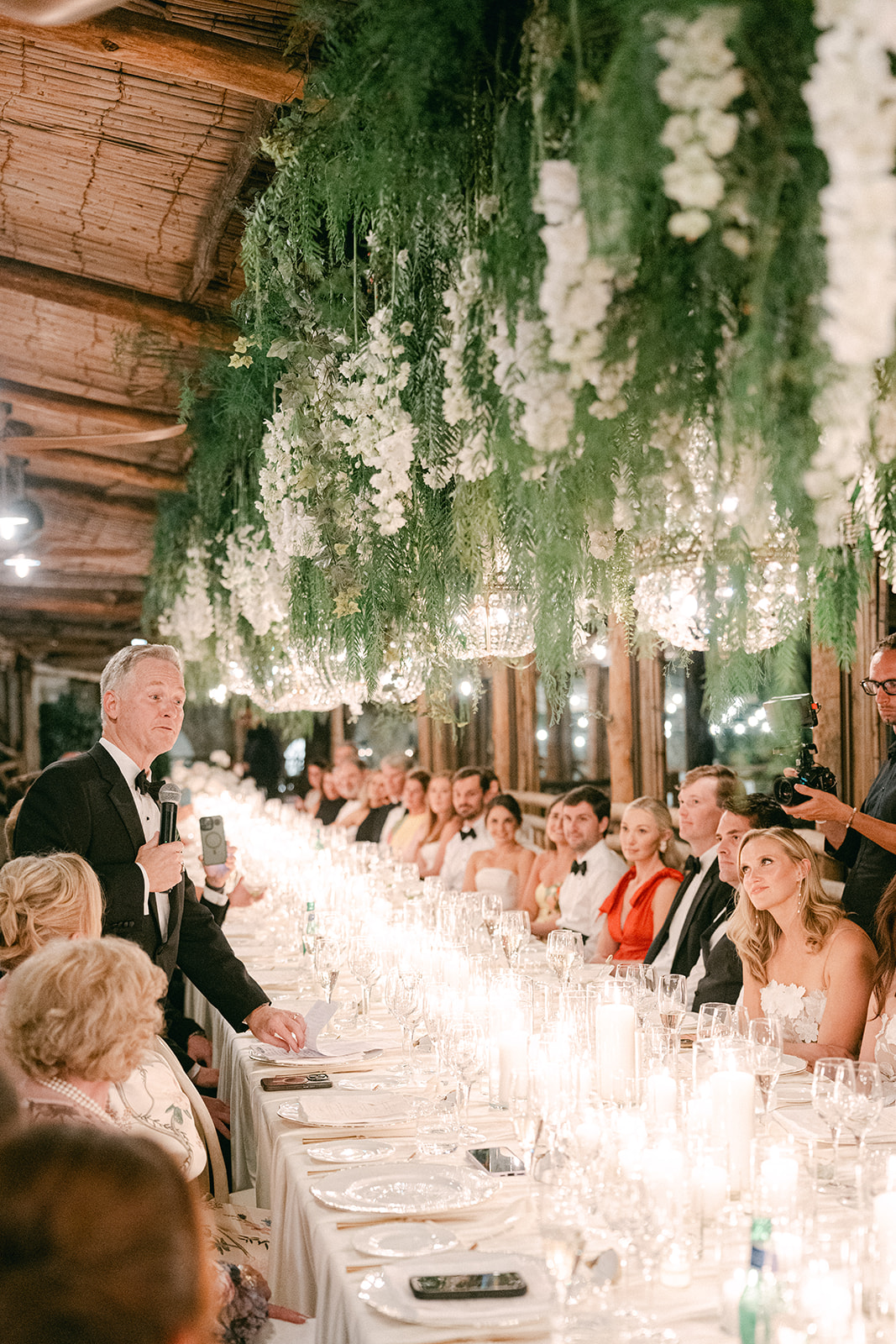 Luxury seaside wedding in Italy with greenery and white florals