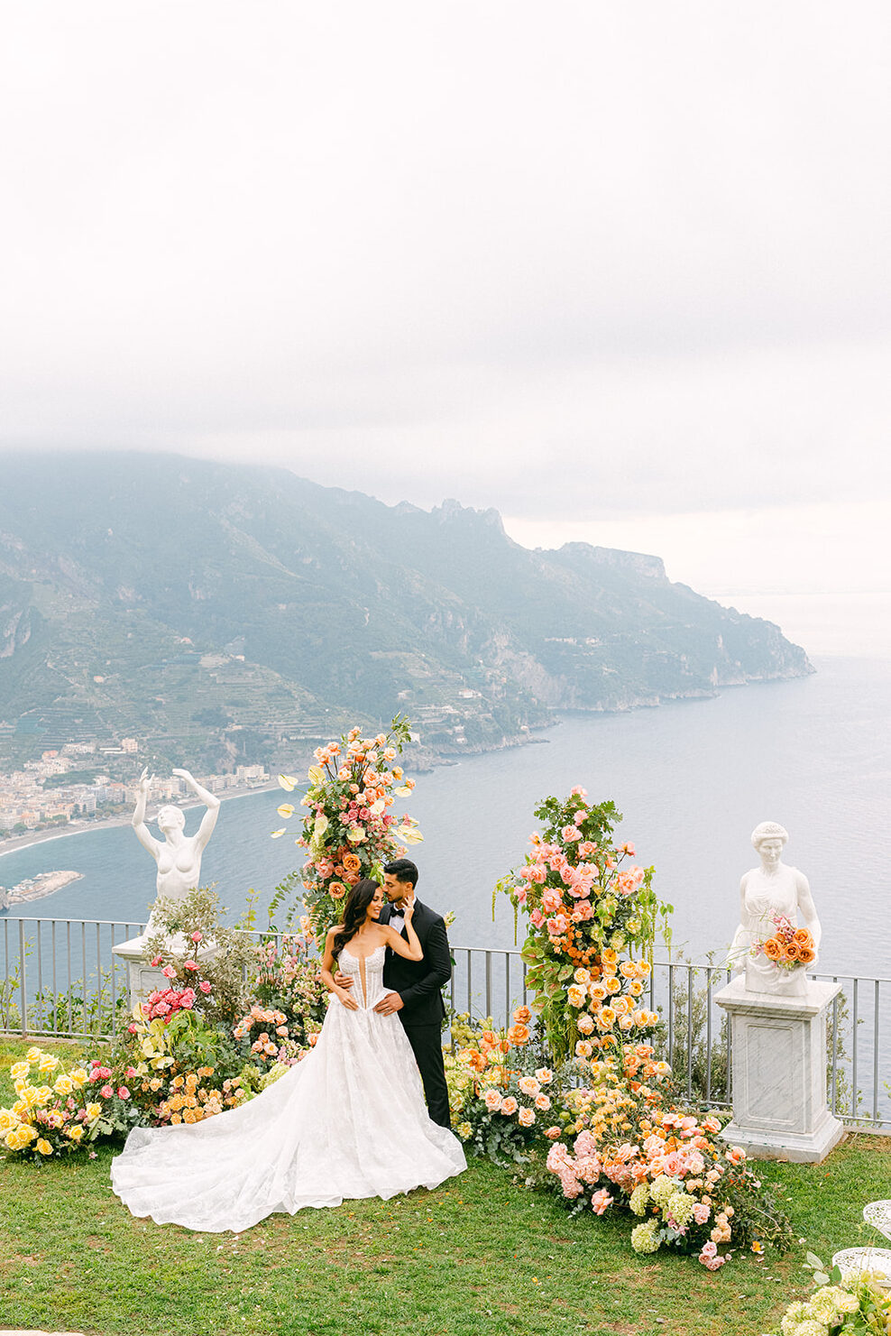 Bride and groom embracing on the terrace at La Rondinaia Amalfi Coast wedding venue