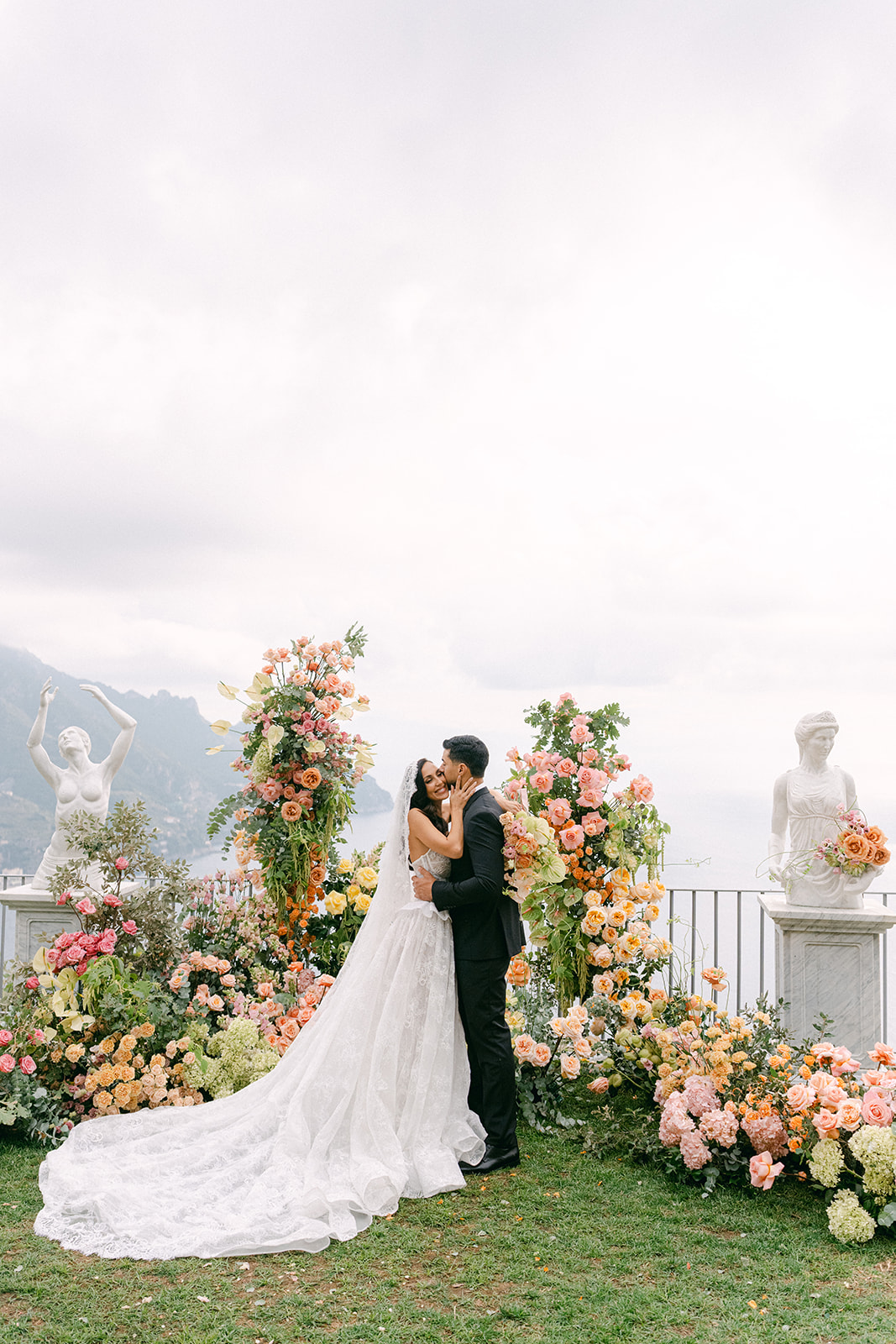 Couple sharing vows with panoramic Amalfi Coast views