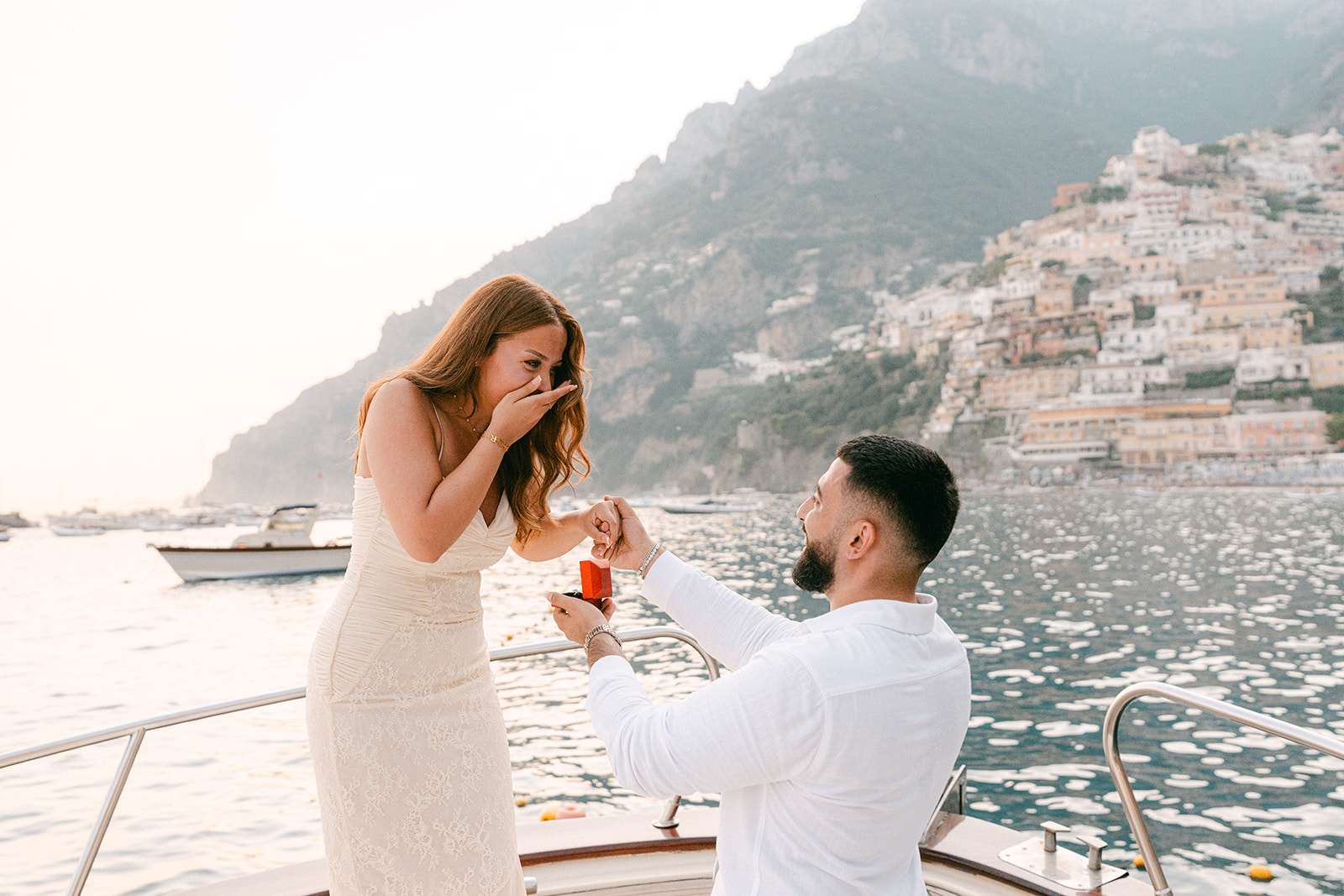 Andrea Gallucci - Destination Wedding Photographer- Amalfi Coast Positano Santorini Barcellona Rome Ravello Paris New York Coastal idea for surprise proposal on the Amalfi Coast on a boat