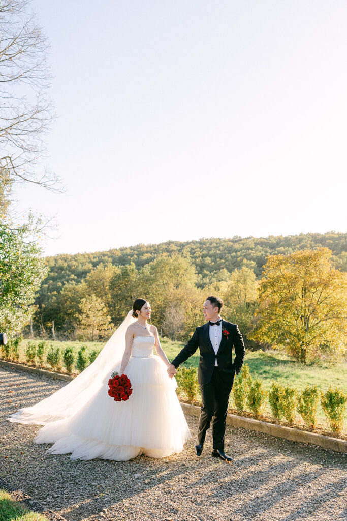 Romantic couple portrait in gardens of Tuscan wedding venue