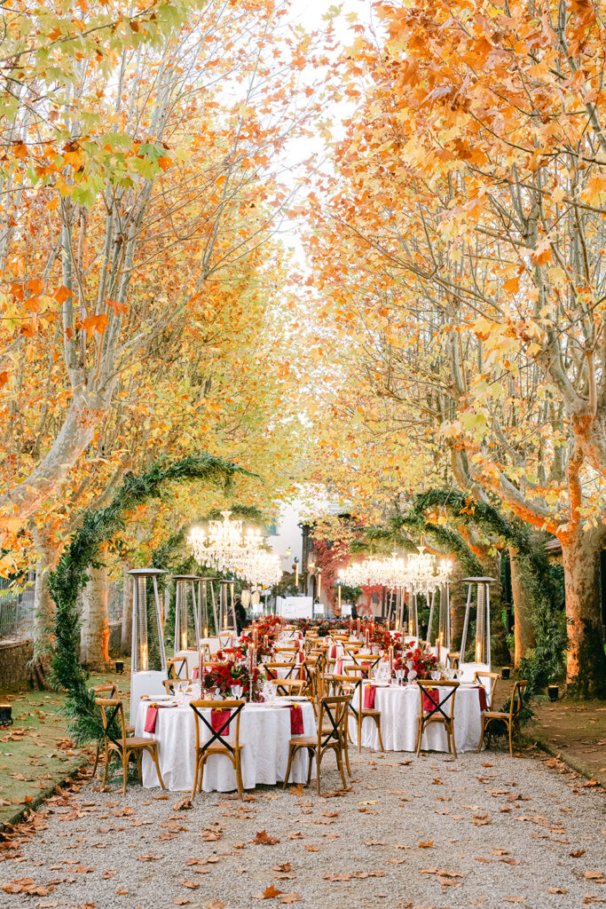 Baroque-inspired Tuscany wedding reception under tree-lined gardens