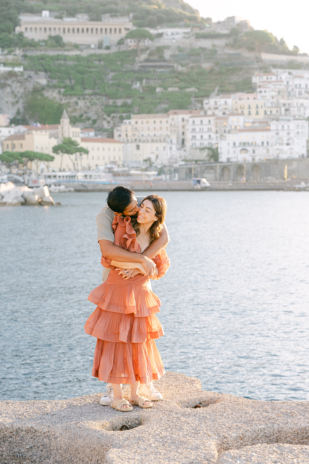 Couple exploring Positano beach during an Amalfi Coast vacation photoshoot