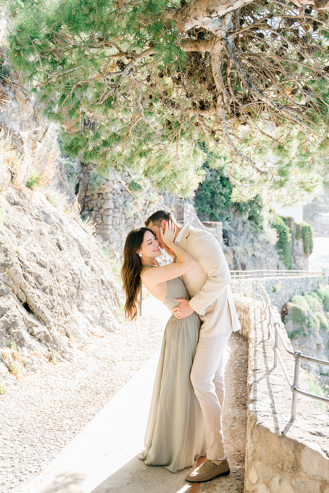 Engagement photoshoot on a scenic Amalfi Coast terrace overlooking the sea