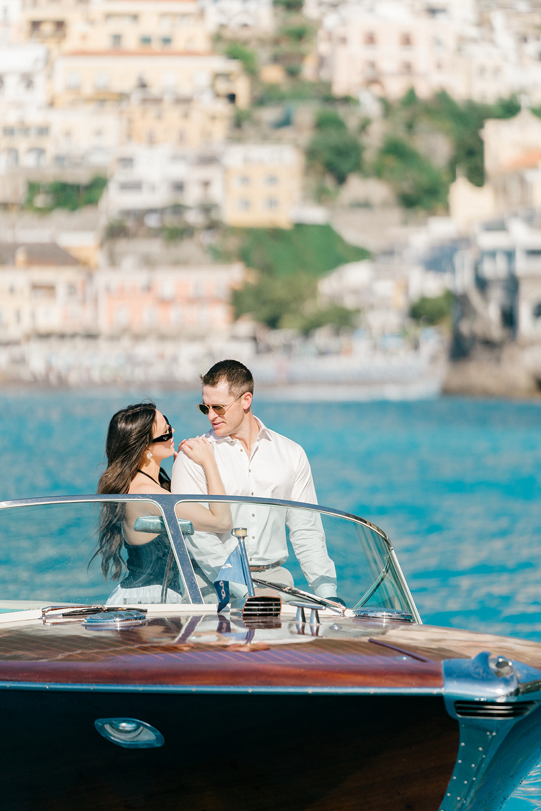Romantic engagement photoshoot on Positano beach during an Amalfi Coast vacation