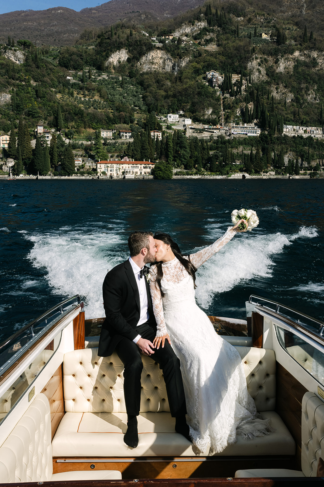 Lake Como elopement private boat tour with couple on the water