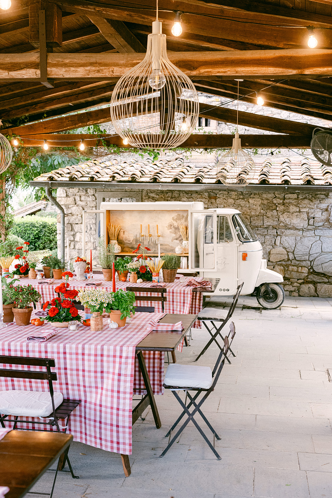 Tuscany wedding welcome dinner with fresh pizza and live Italian music at Borgo Corsignano