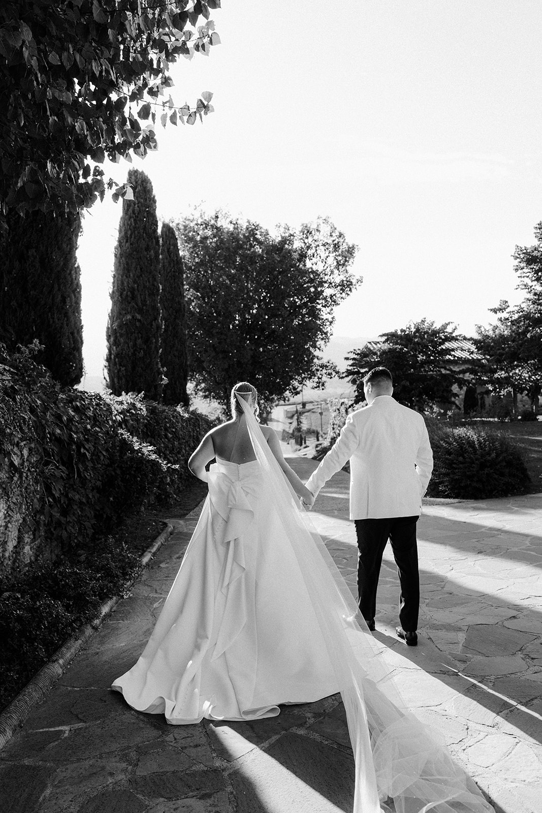 Romantic bride and groom portraits at Borgo Corsignano in Tuscany