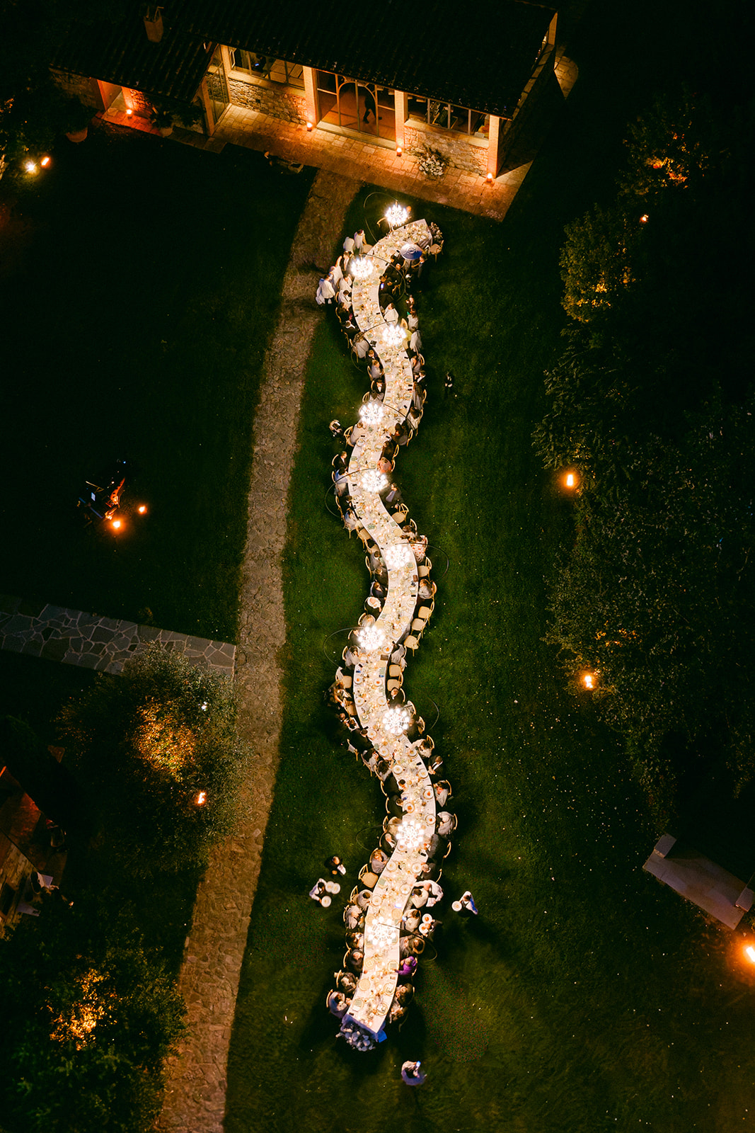 Wedding guests celebrating during a luxury Tuscany wedding reception