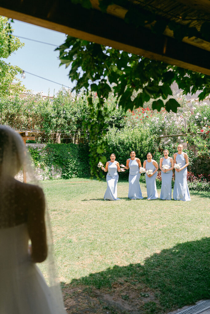 Andrea Gallucci - Destination Wedding Photographer- Amalfi Coast Positano Santorini Barcellona Rome Ravello Paris New York Bridesmaids seeing the bride in her wedding dress for the first time