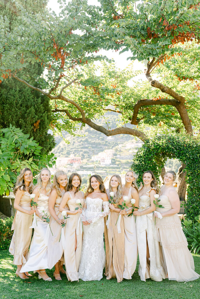Andrea Gallucci - Destination Wedding Photographer- Amalfi Coast Positano Santorini Barcellona Rome Ravello Paris New York Bridal party walking together with bouquets before the ceremony