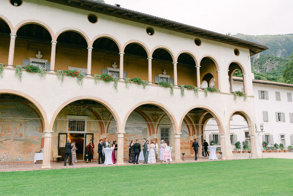 Intimate Italian vow renewal surrounded by vineyards and mountain scenery