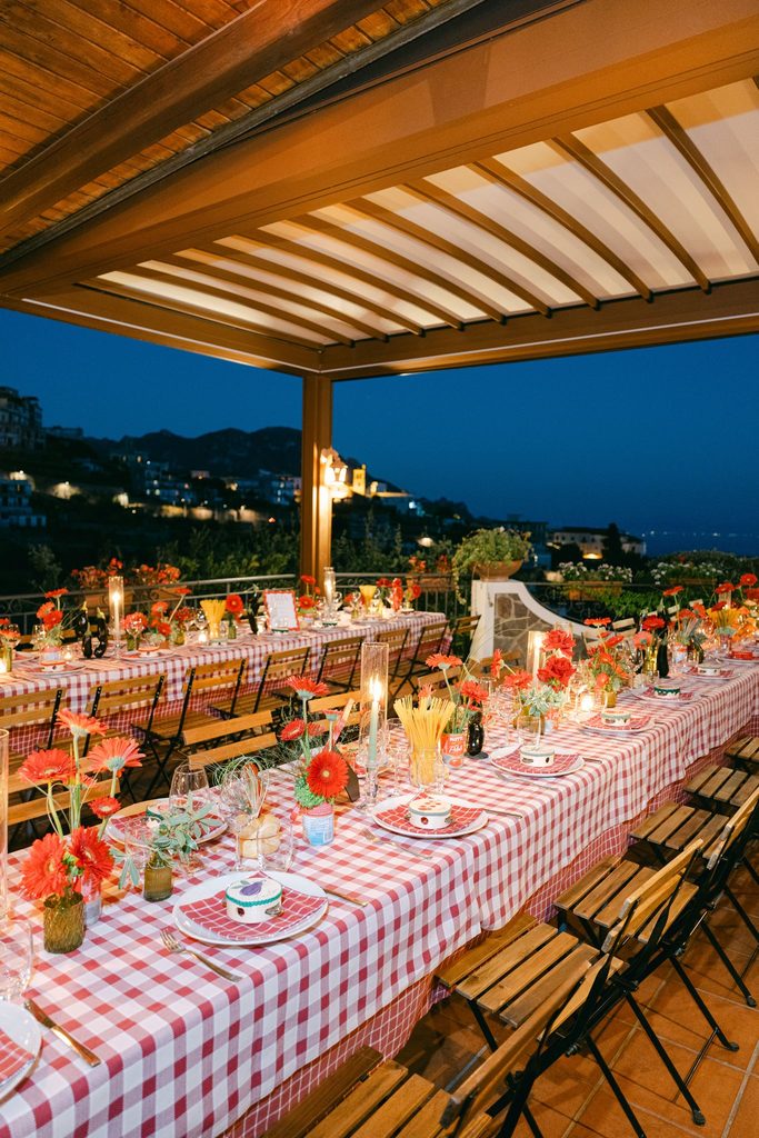 Andrea Gallucci - Destination Wedding Photographer- Amalfi Coast Positano Santorini Barcellona Rome Ravello Paris New York Red and white gingham table decorations for an Italian themed wedding welcome party