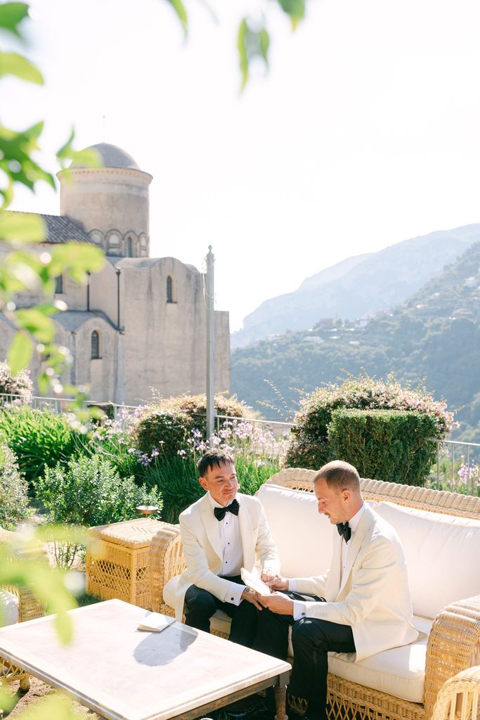 Andrea Gallucci - Destination Wedding Photographer- Amalfi Coast Positano Santorini Barcellona Rome Ravello Paris New York Intimate LGBTQ wedding moment as two grooms exchange personal vows in Ravello