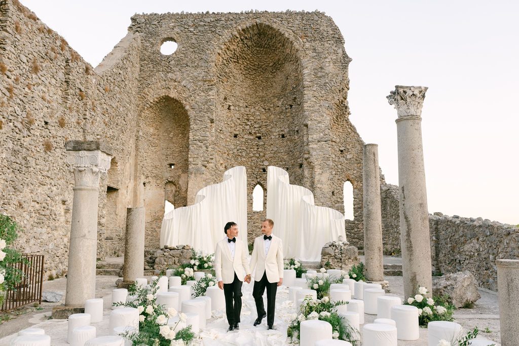 Andrea Gallucci - Destination Wedding Photographer- Amalfi Coast Positano Santorini Barcellona Rome Ravello Paris New York Elegant white drapery and floral wedding ceremony decorations at the ruins of Sant'Eustachio